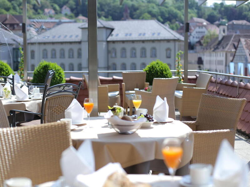 Start with a gernerous breakfast on the terrace of the 4-star-superior hotel Ringhotel Hohenlohe in Schwaebisch Hall 