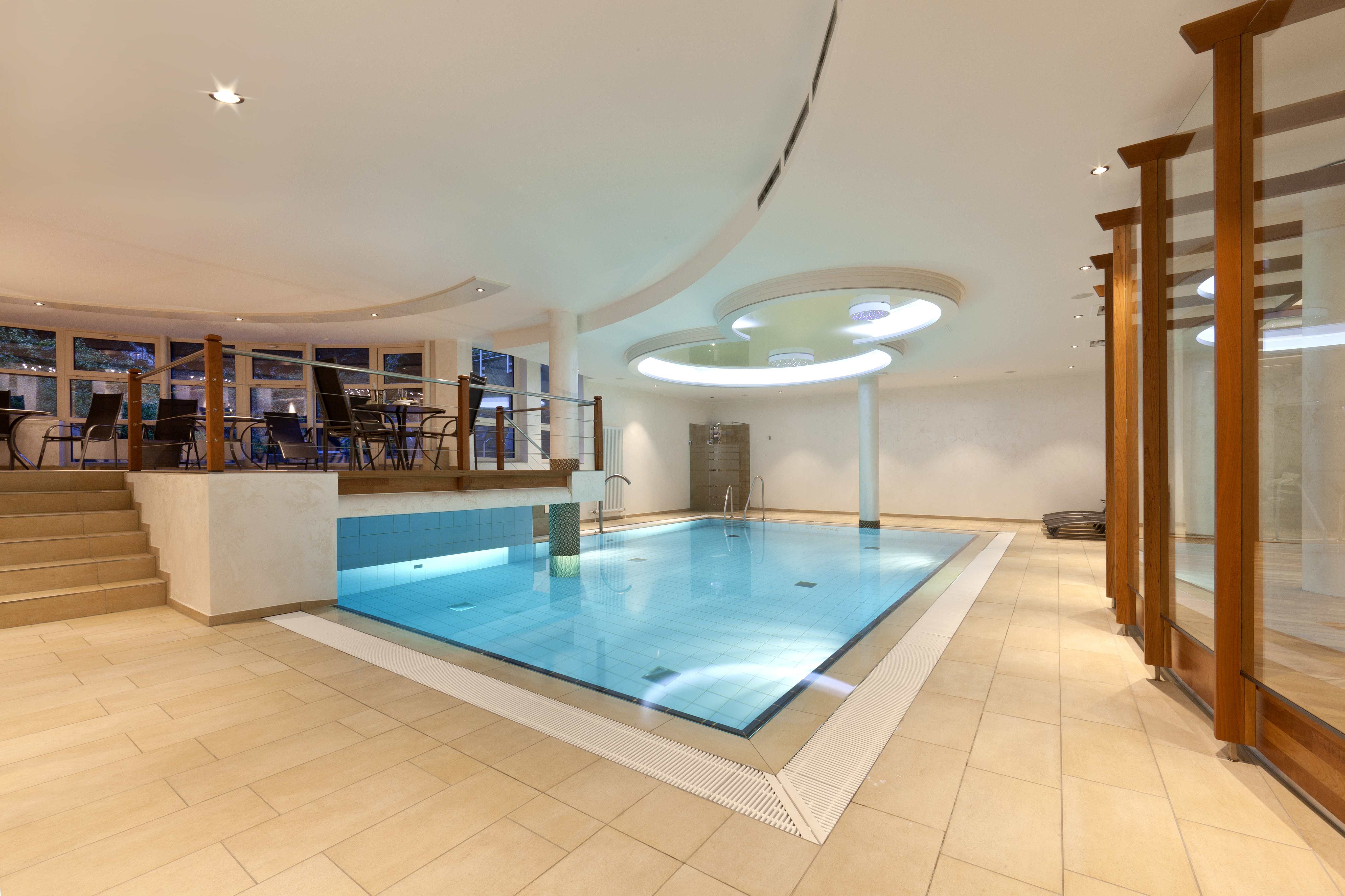 Attractive designed pool area in the 4-star hotel Ringhotel Am Stadtpark in Luenen